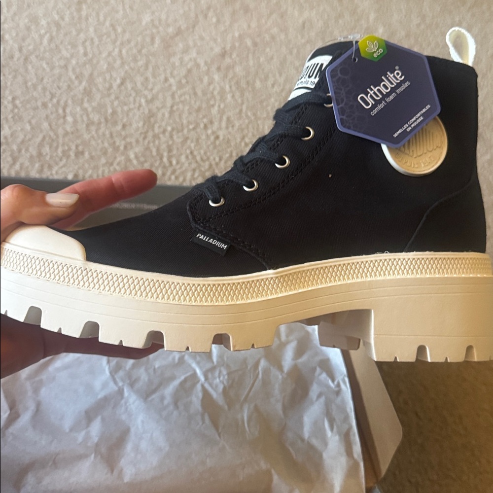 Palladium Black and Cream high top tennis shoes. New with tags. Size 7.5 women’s